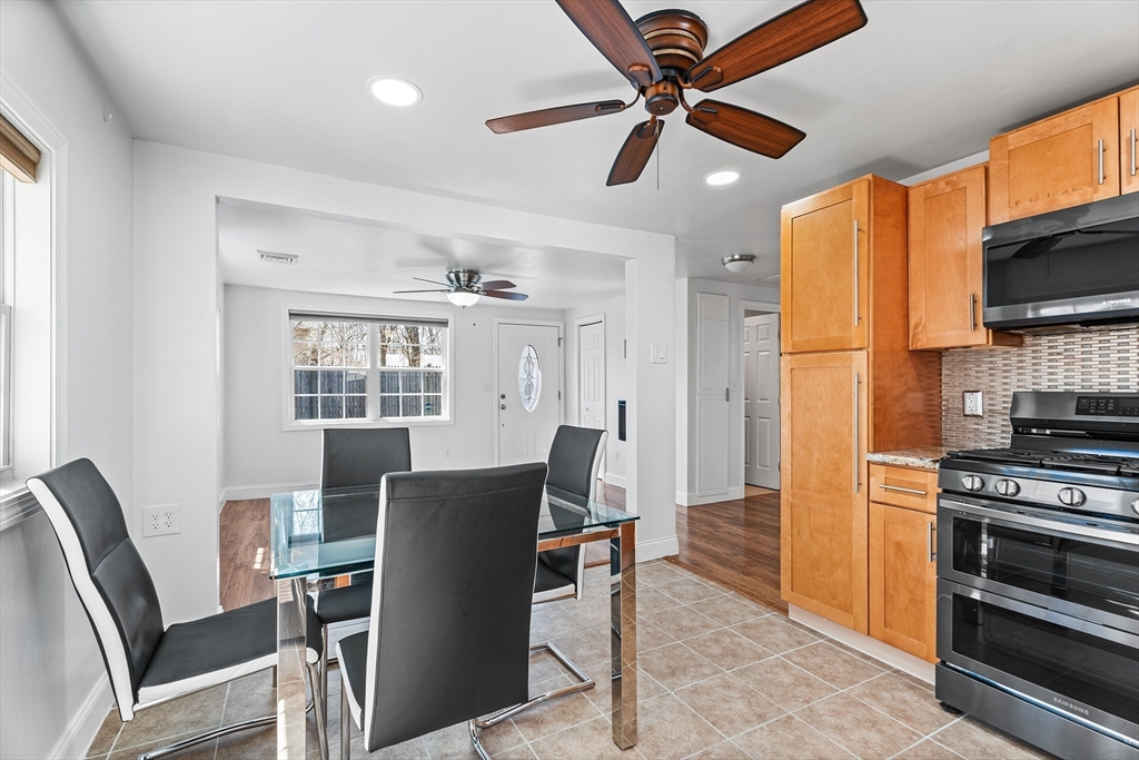 32 Shaw Road Brockton, MA 02301 - Photo 8 of 27 a view of a dining room with furniture window and wooden floor