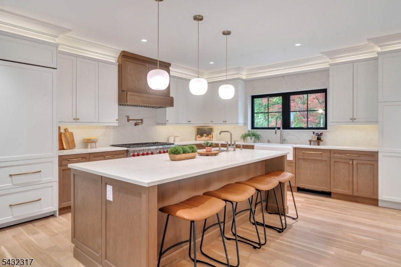 266 Brooklake Road Florham Park, NJ 07932 - Photo 15 of 50 a kitchen with a sink and cabinets