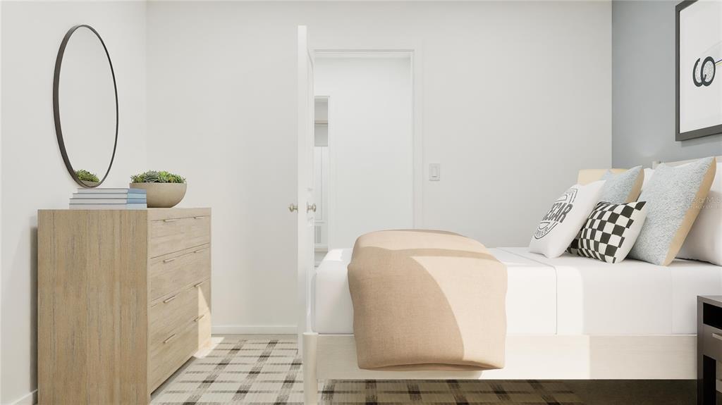 5620 Morant Bay Path Kissimmee, FL 34758 - Photo 14 of 34 a bedroom with a bed a mirror and a potted plant