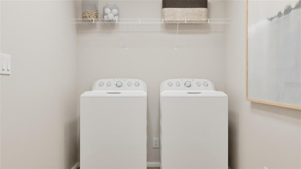 5620 Morant Bay Path Kissimmee, FL 34758 - Photo 15 of 34 a utility room with dryer and washer