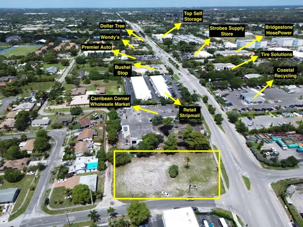 an aerial view of multiple houses with outdoor space
