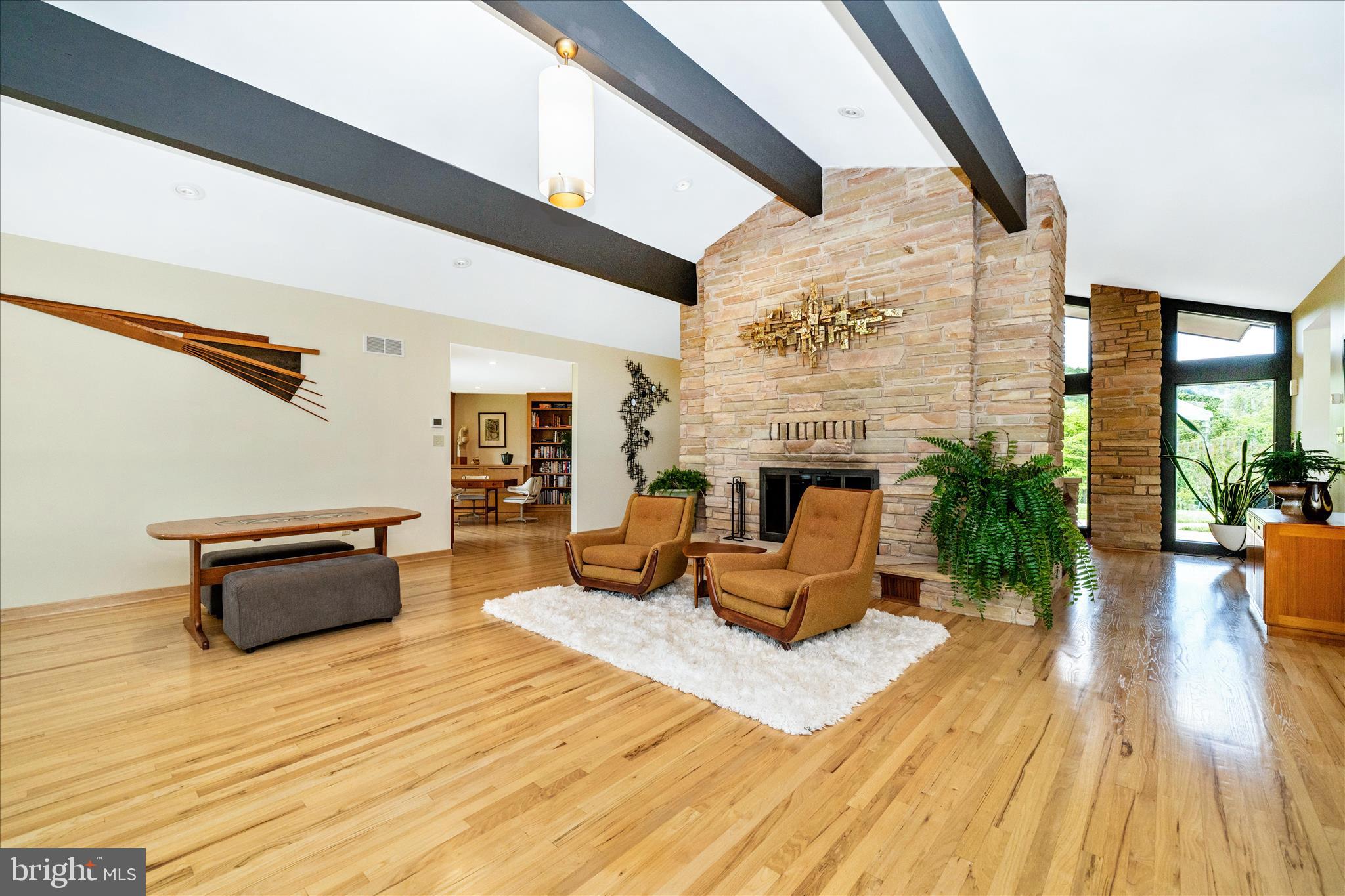 9237 Frostown Road Middletown, MD 21769 - Photo 7 of 113 a living room with furniture and a fireplace