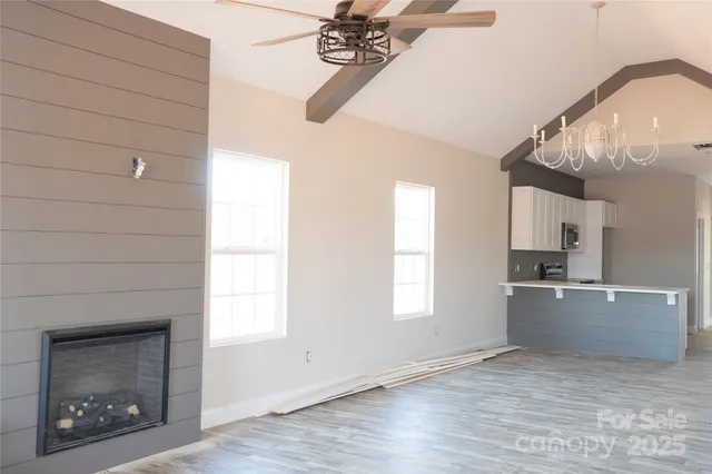a view of a room that has a fireplace in it