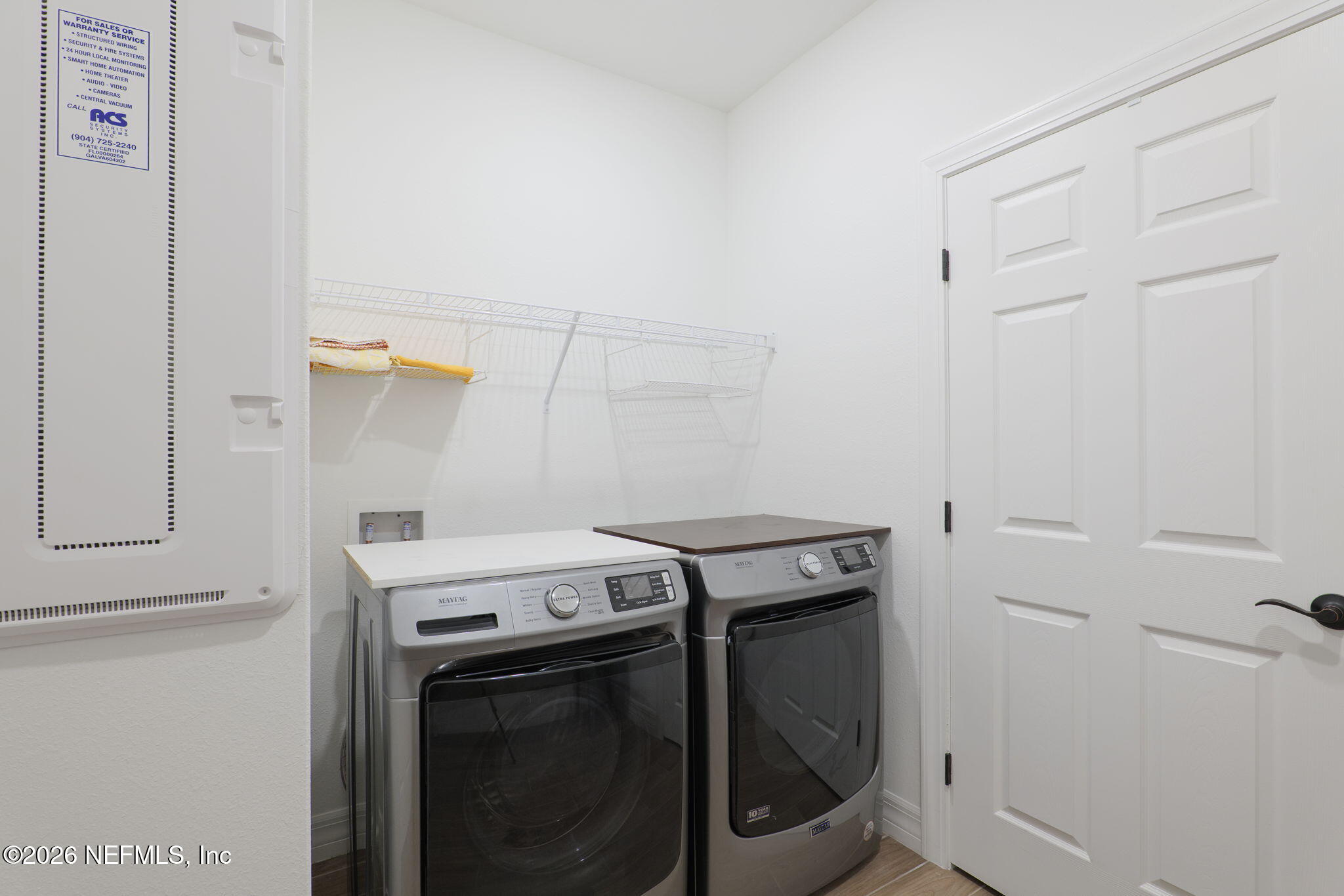 408 Del Webb Parkway Yulee, FL 32097 - Photo 11 of 35 a utility room with dryer and washer