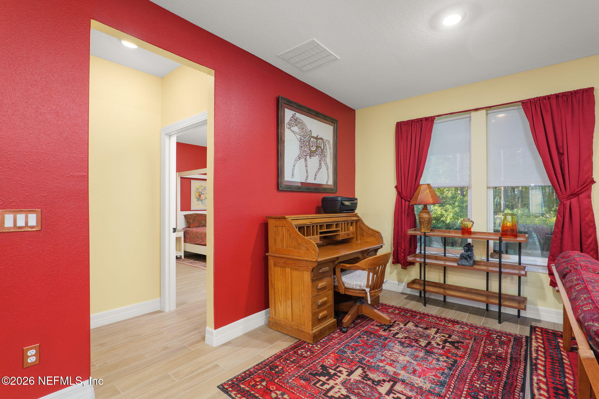 408 Del Webb Parkway Yulee, FL 32097 - Photo 16 of 35 a room with furniture and a rug