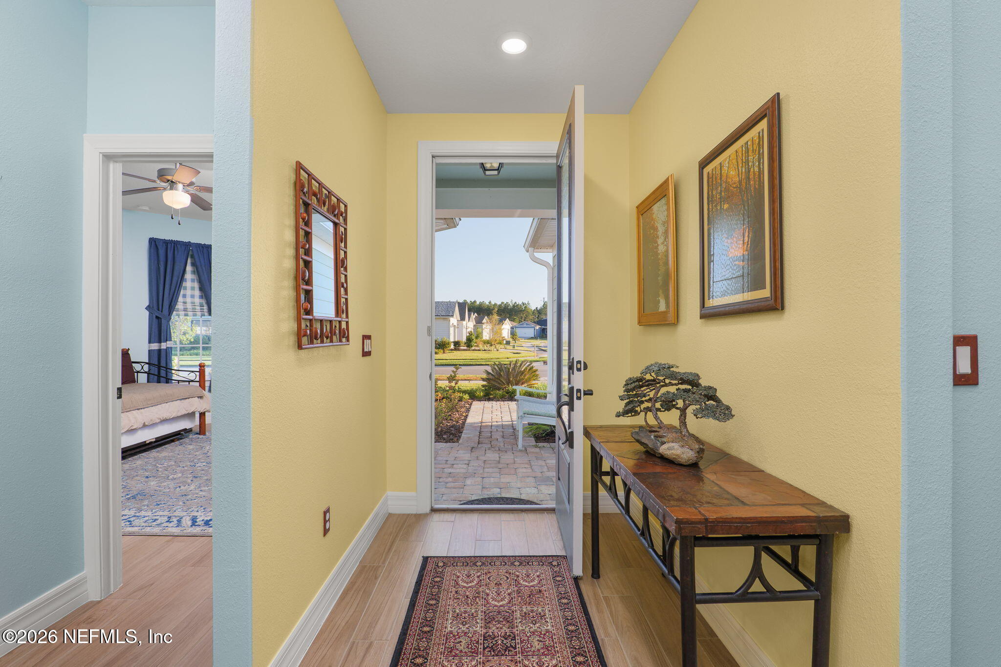 408 Del Webb Parkway Yulee, FL 32097 - Photo 2 of 35 a bathroom with a sink and mirror