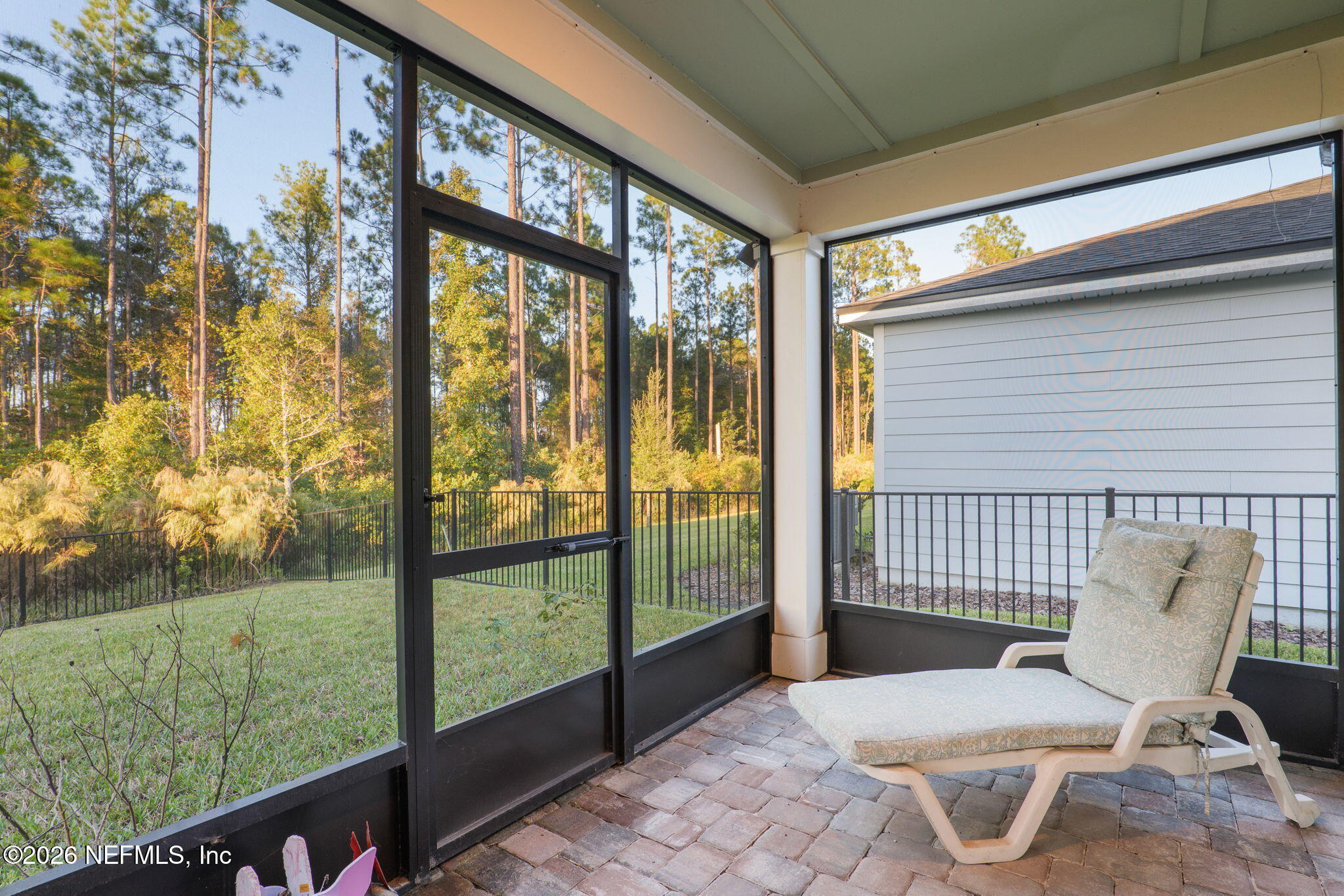 408 Del Webb Parkway Yulee, FL 32097 - Photo 21 of 35 a view of a chair and table in the balcony