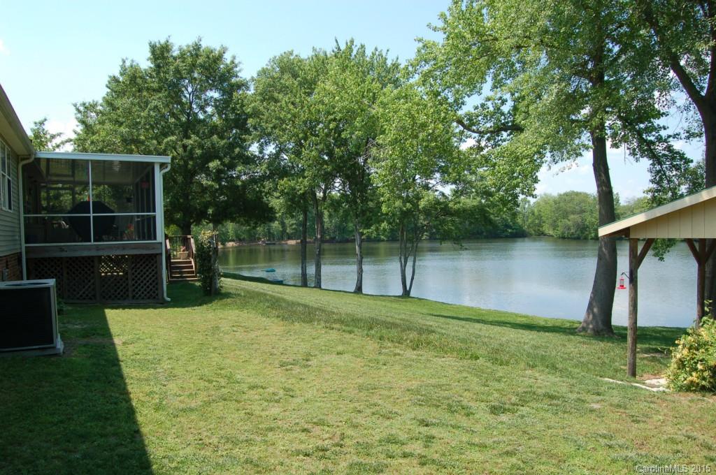 1880 Flat Rock Road York, SC 29745 - Photo 20 of 23 a view of a backyard with wooden fence