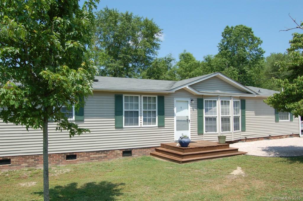 1880 Flat Rock Road York, SC 29745 - Photo 23 of 23 a front view of a house with a yard