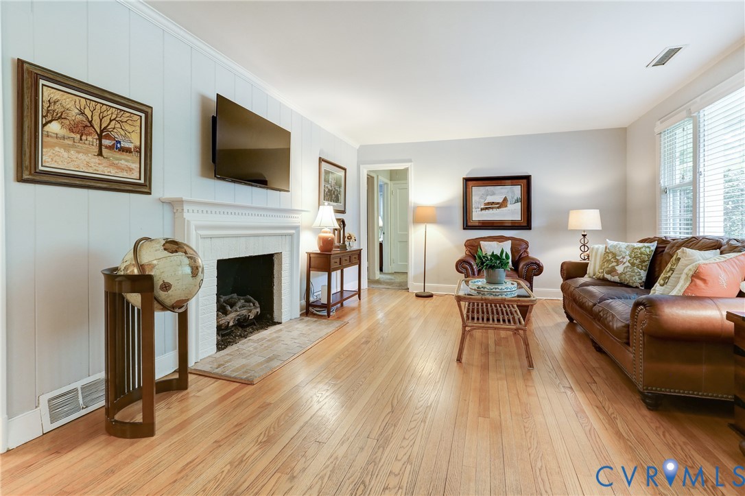 1401 Chowan Road Henrico, VA 23229 - Photo 8 of 39 Living area featuring wood-finish flooring, a whit