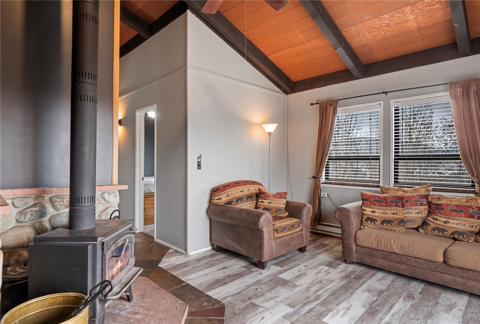 809 Ryan Gulch Road, Unit 809 Silverthorne, CO 80498 - Photo 6 of 18 a living room with furniture and a window