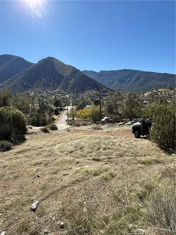a view of a mountain with a outdoor space