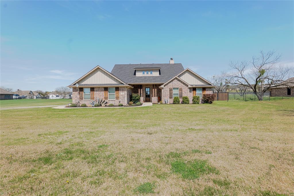 470 Wilson Bend Road Millsap, TX 76066 - Photo 5 of 39 a front view of a house with garden