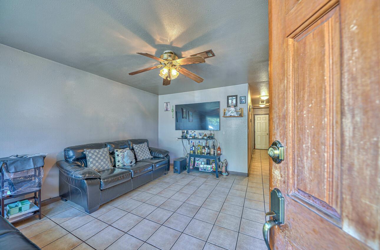 415 Michael Circle Gonzales, CA 93926 - Photo 2 of 16 a living room with furniture and a chandelier