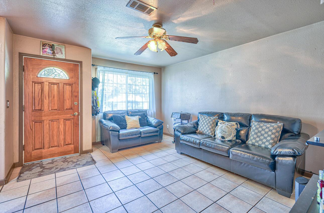 415 Michael Circle Gonzales, CA 93926 - Photo 3 of 16 a living room with furniture and a window