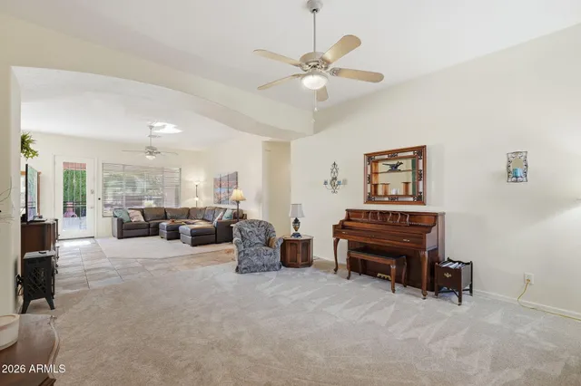 a kitchen with stainless steel appliances granite countertop a sink stove and microwave