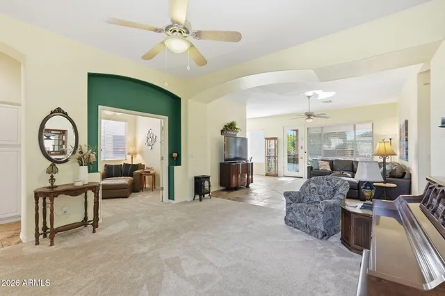 a kitchen with stainless steel appliances granite countertop a refrigerator and a stove