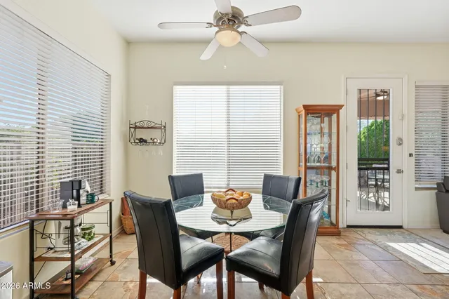 a bedroom with a bed and a mirror