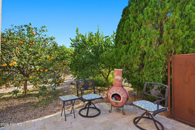 an aerial view of residential houses with outdoor space and river