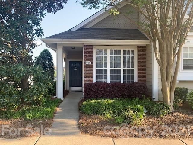919 Azurine Circle Fort Mill, SC 29708 - Photo 2 of 19 a front view of a house with a yard