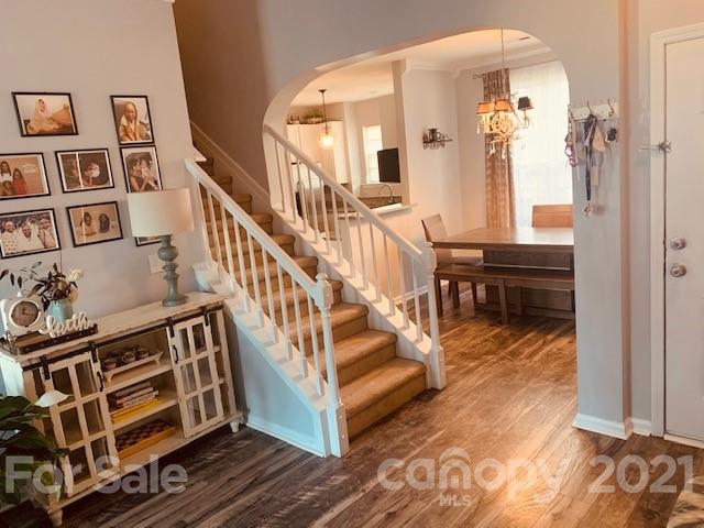 919 Azurine Circle Fort Mill, SC 29708 - Photo 11 of 19 a view of staircase with wooden floor and a large window
