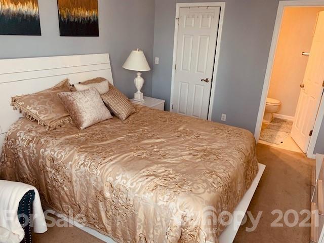 919 Azurine Circle Fort Mill, SC 29708 - Photo 16 of 19 a bedroom with a bed and a painting on the wall