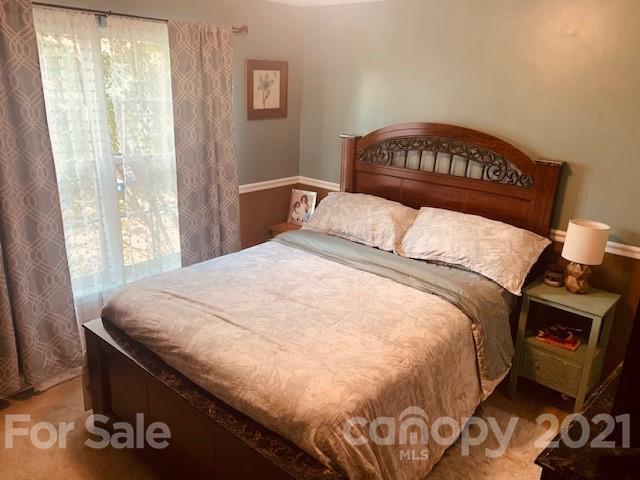 919 Azurine Circle Fort Mill, SC 29708 - Photo 17 of 19 a bedroom with a bed and a window
