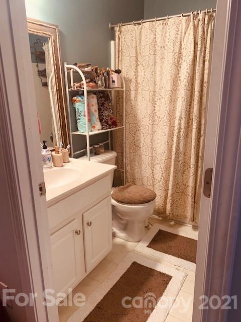 919 Azurine Circle Fort Mill, SC 29708 - Photo 19 of 19 a bathroom with a sink toilet and shower