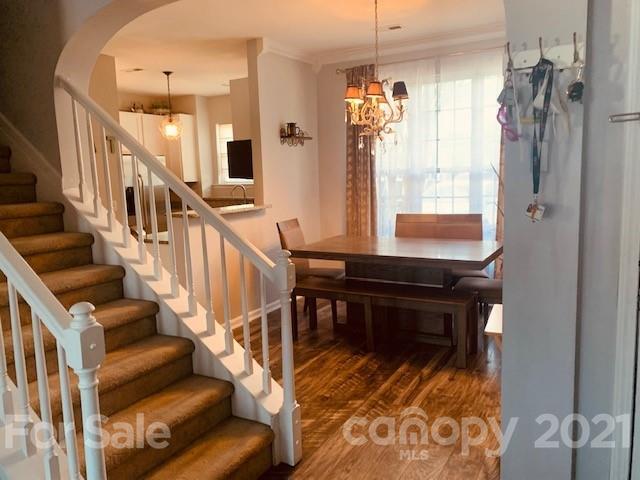 919 Azurine Circle Fort Mill, SC 29708 - Photo 5 of 19 a view of a livingroom with furniture wooden floor and windows