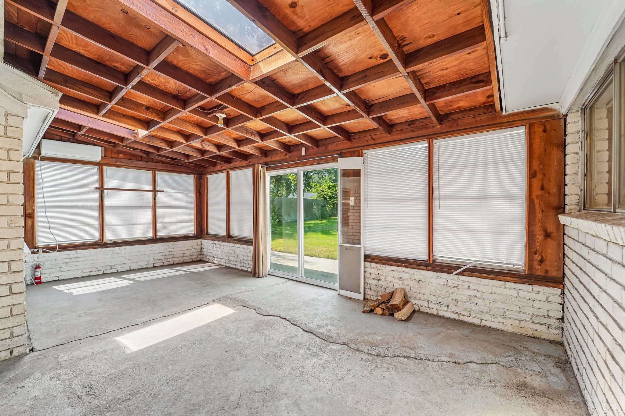 6123 Rena Street Houston, TX 77092 - Photo 36 of 48 Back porch has been enclosed and air conditioned with a mini-split unit