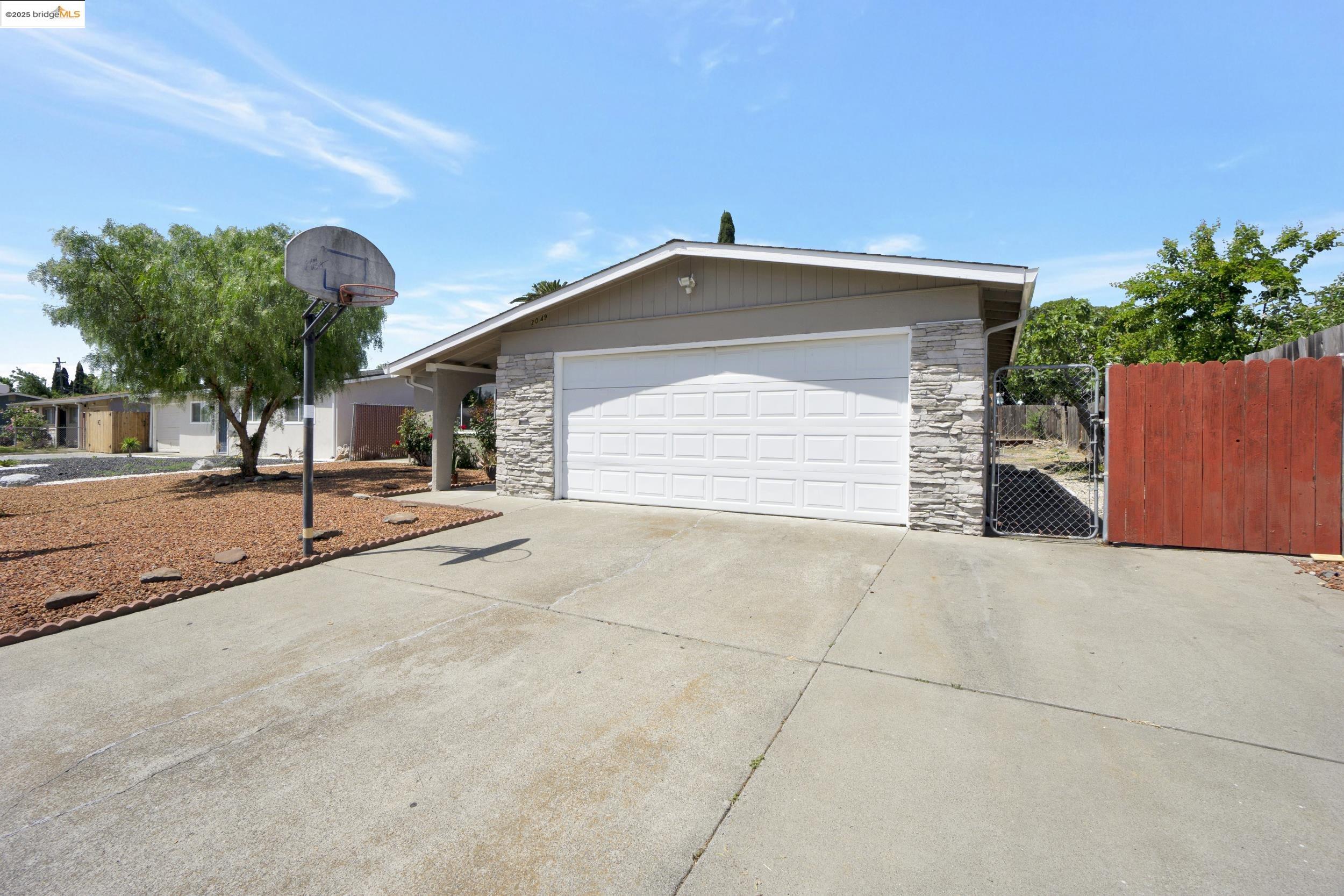 2049 Plum Tree Way Fairfield, CA 94533 - Photo 1 of 1 a view of the house with a yard