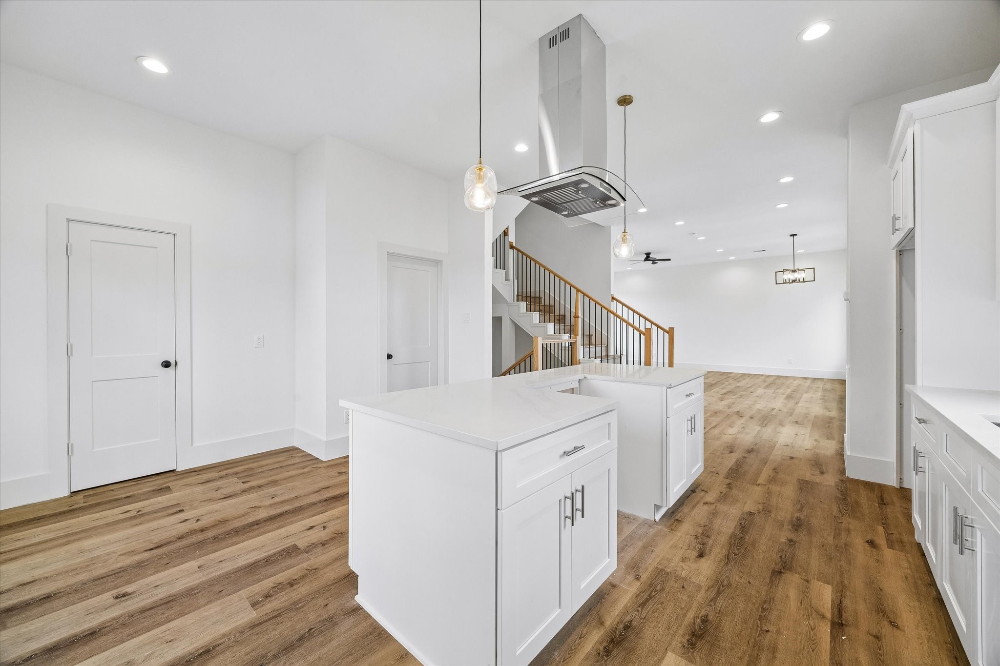 5508 Hardy Street Houston, TX 77009 - Photo 11 of 31 a hallway view with wooden floor and staircase