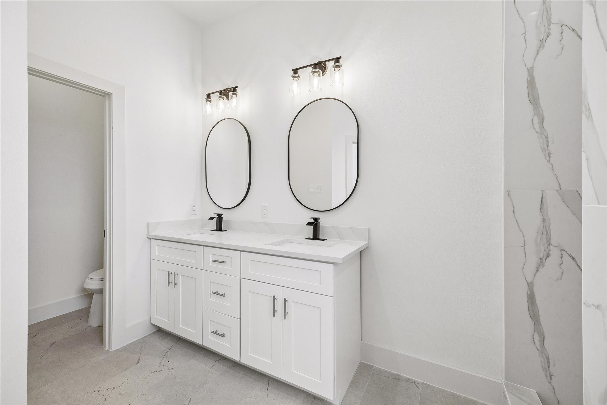 5508 Hardy Street Houston, TX 77009 - Photo 16 of 31 a bathroom with a sink and a mirror