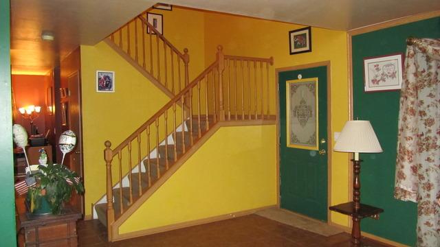 485 Rebecca Lane Bolingbrook, IL 60440 - Photo 2 of 16 a view of entryway and hall with wooden floor