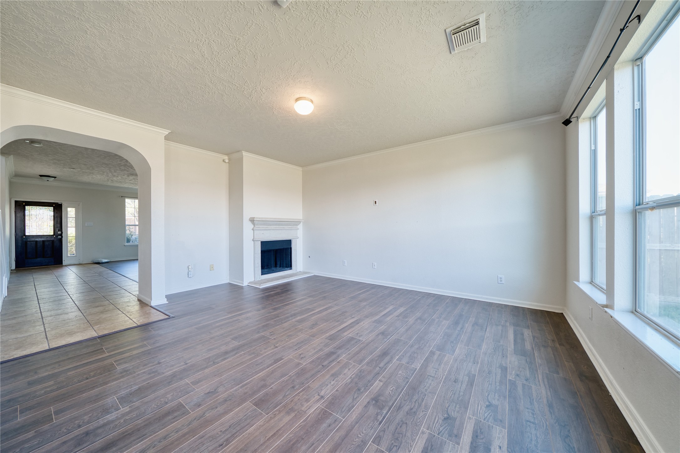 6610 Autumn Sunset Lane Spring, TX 77379 - Photo 14 of 45 wooden floor in an empty room with a window