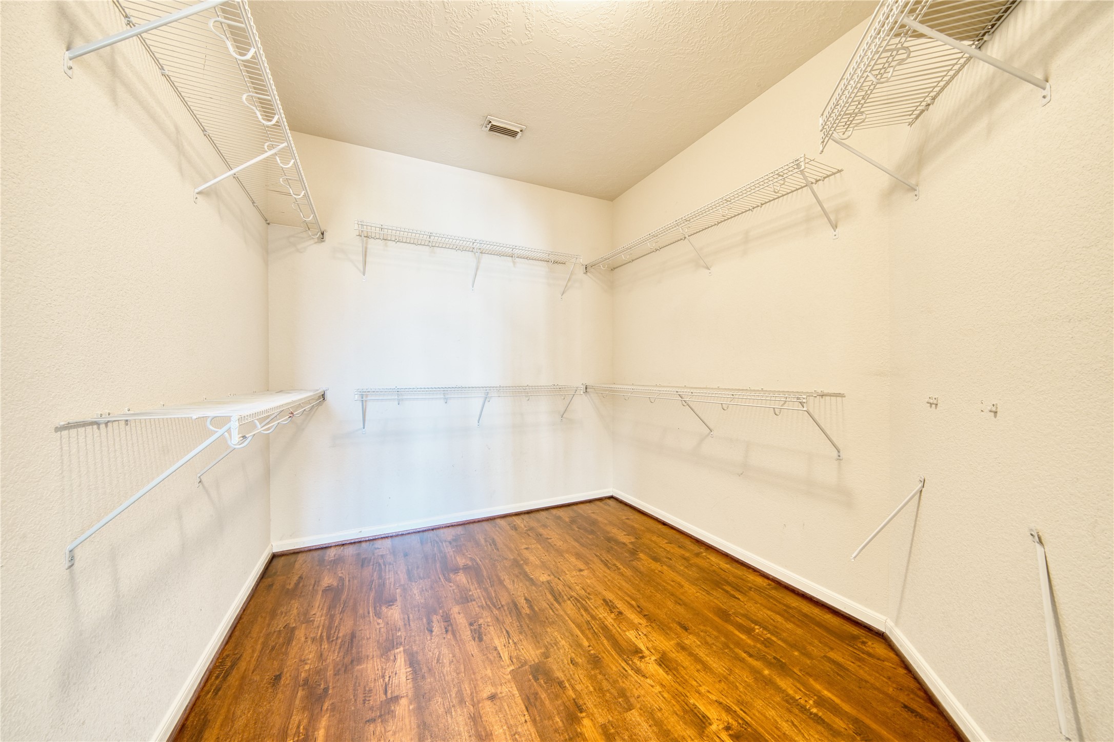 6610 Autumn Sunset Lane Spring, TX 77379 - Photo 21 of 45 a view of a room with wooden floor