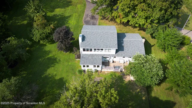 a view of an apartment with a garden