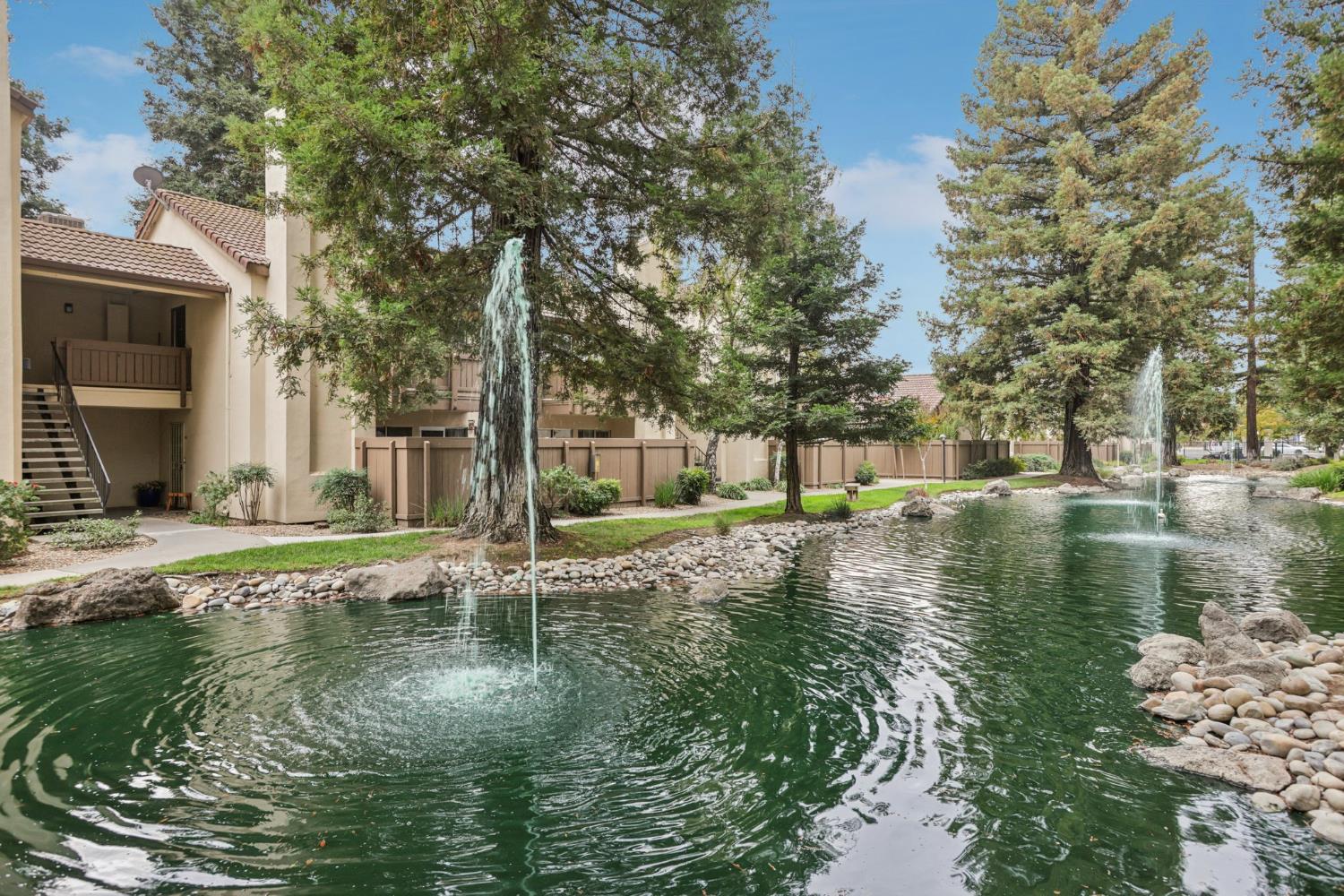 3700 Tully Road, Unit 57 Modesto, CA 95356 - Photo 23 of 34 a view of a lake with houses