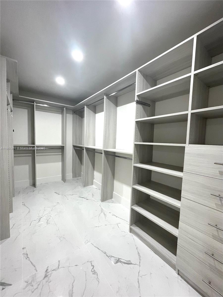 3430 Galt Ocean Drive, Unit 908 Fort Lauderdale, FL 33308 - Photo 11 of 17 a view of walk in closet with empty racks