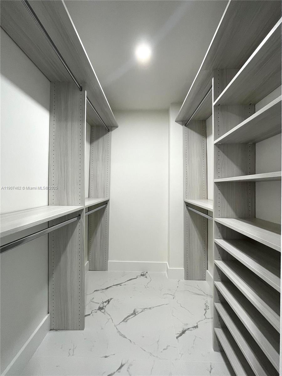 3430 Galt Ocean Drive, Unit 908 Fort Lauderdale, FL 33308 - Photo 15 of 17 a view of walk in closet with empty racks
