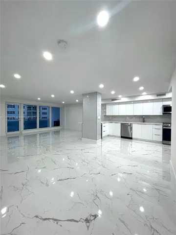 a view of a kitchen with a sink