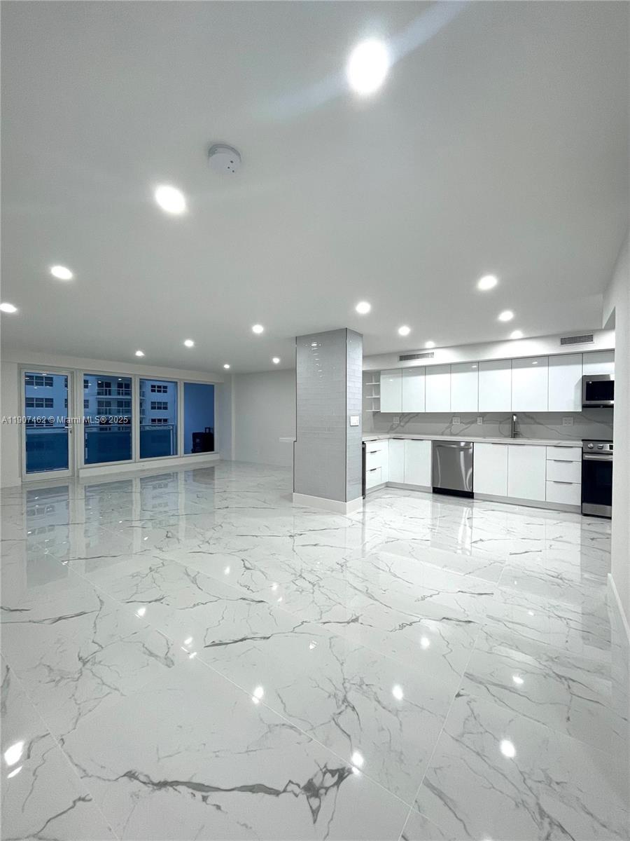 3430 Galt Ocean Drive, Unit 908 Fort Lauderdale, FL 33308 - Photo 6 of 17 a view of a kitchen with a sink