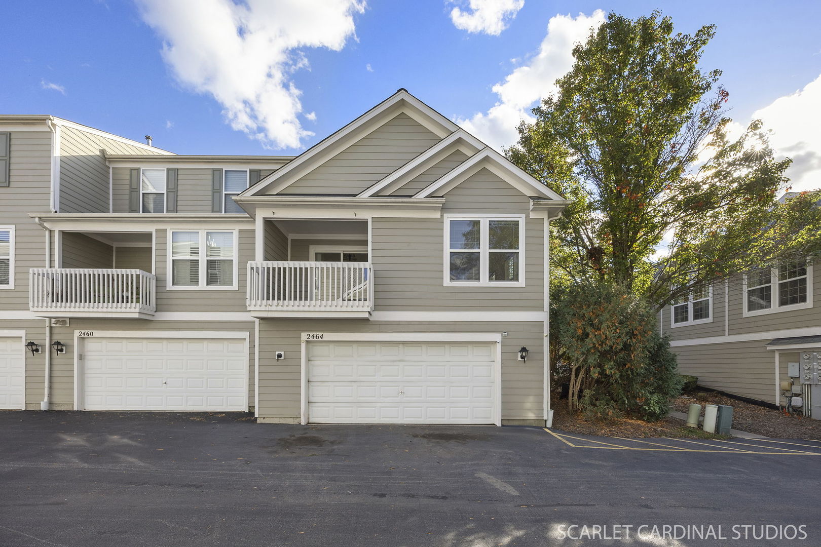 2464 Emily Lane Elgin, IL 60124 - Photo 16 of 16 a front view of a house with a yard and garage