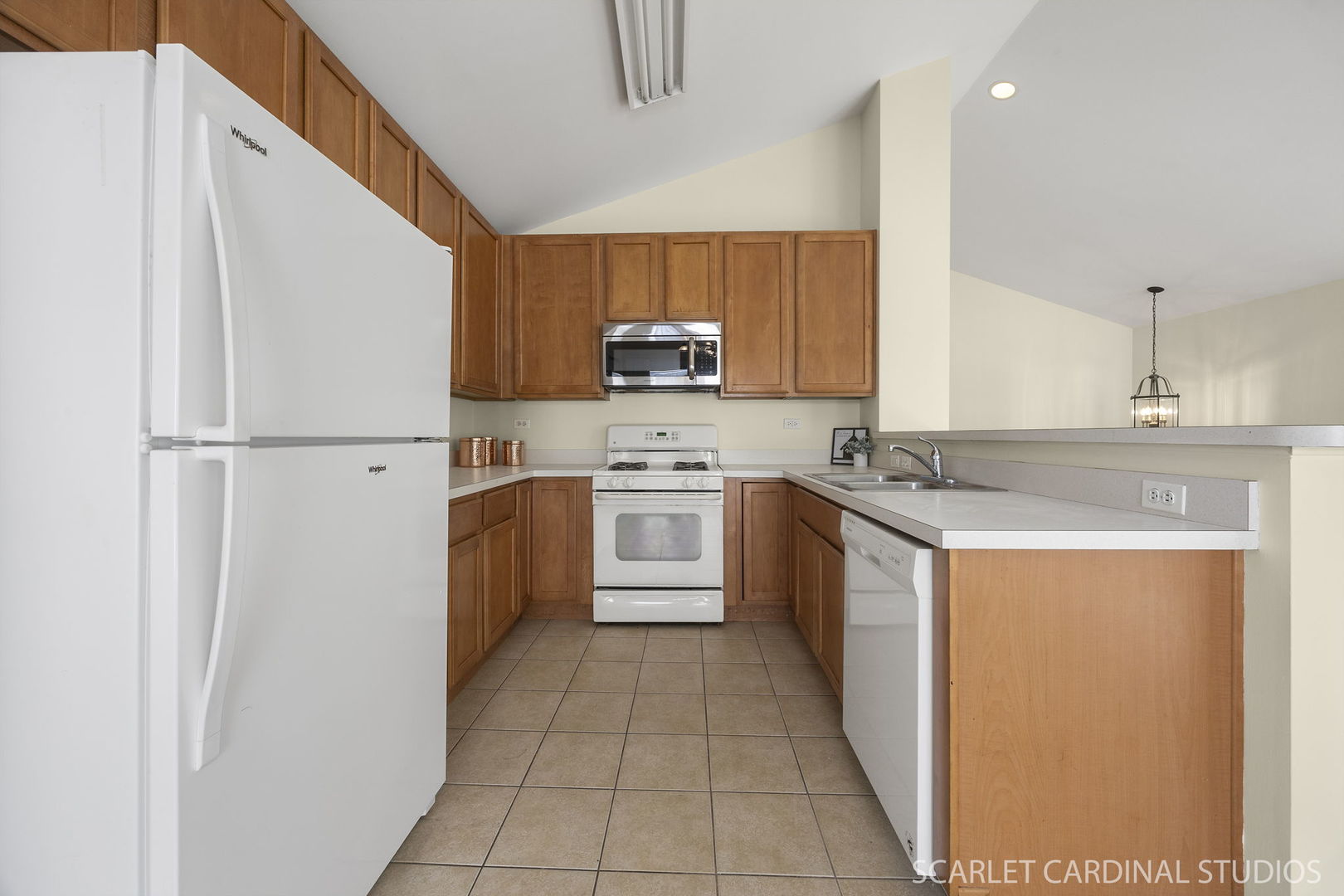 2464 Emily Lane Elgin, IL 60124 - Photo 5 of 16 a kitchen with a stove top oven sink and cabinets