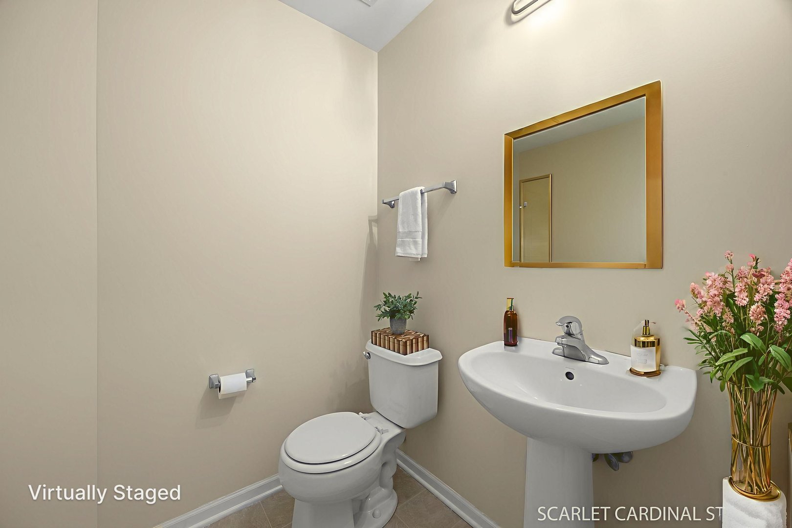 2464 Emily Lane Elgin, IL 60124 - Photo 9 of 16 a bathroom with a toilet a sink and mirror