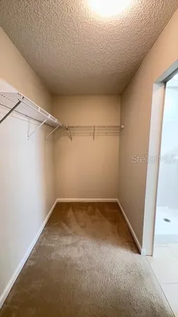 a view of a room with an empty space