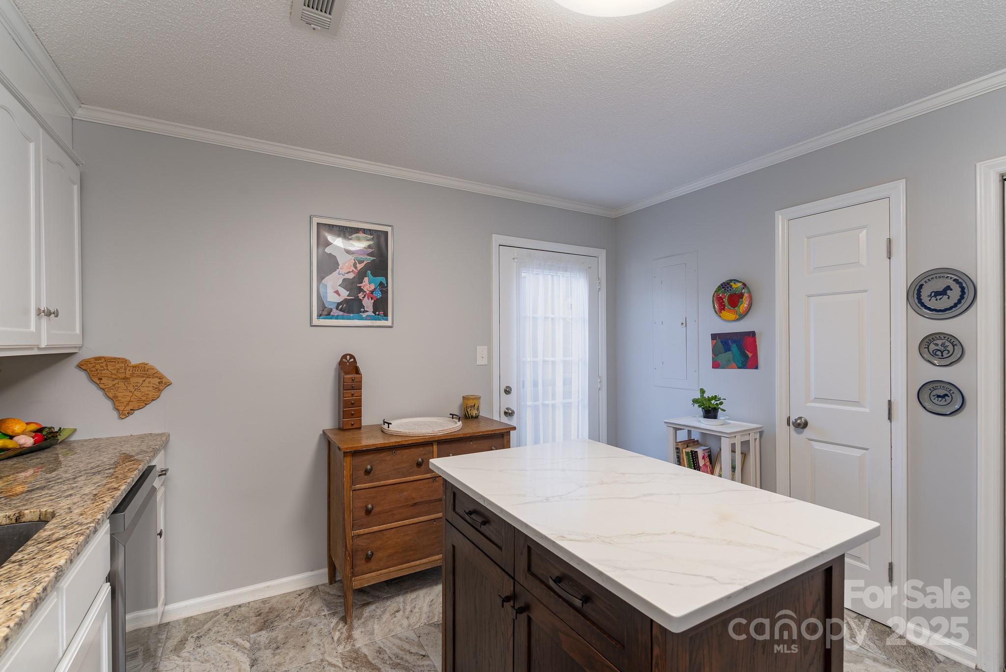 201 Pointe Circle Rock Hill, SC 29732 - Photo 13 of 32 a kitchen that has a cabinets and a stove in it