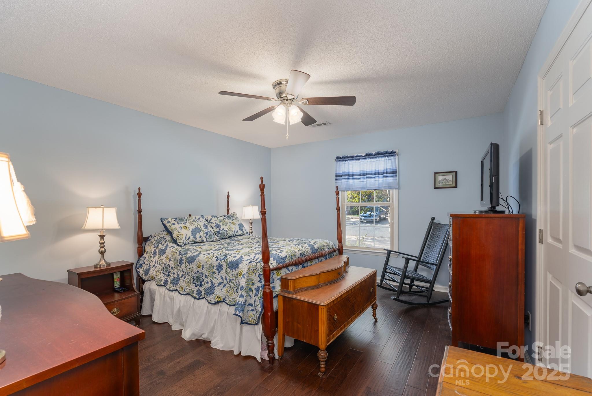 201 Pointe Circle Rock Hill, SC 29732 - Photo 16 of 32 a bedroom with furniture and a chandelier