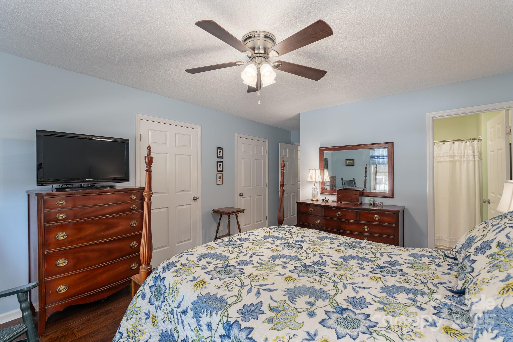 201 Pointe Circle Rock Hill, SC 29732 - Photo 17 of 32 a bedroom with a bed and a flat screen tv