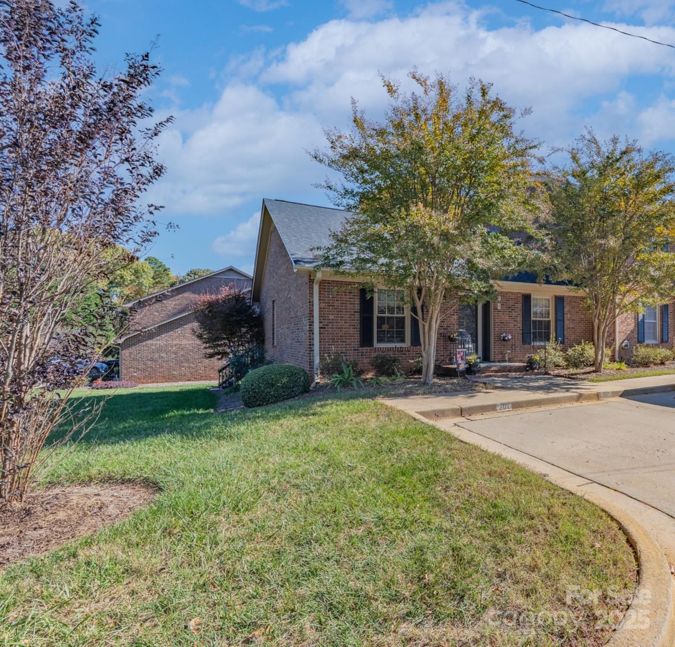 201 Pointe Circle Rock Hill, SC 29732 - Photo 23 of 32 front view of a house with a yard and trees